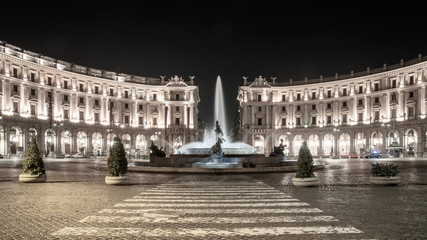 Fototapeta premium The Fountain of the Naiads and the Republic square in Rome at night.