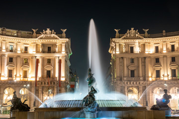 Fototapeta premium The Fountain of the Naiads and the Republic square in Rome at night.