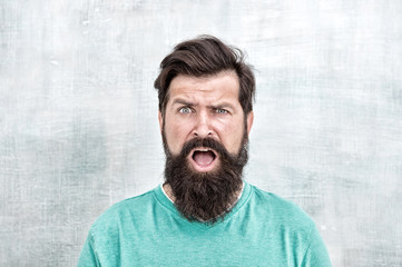 Wondering what. Hipster appearance. Man bearded hipster stylish beard. Stylish beard and mustache...
