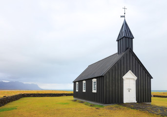 Fototapeta premium View of Buoakirja Black Church in summer, Snaefellsness Peninsula, Iceland, Europe