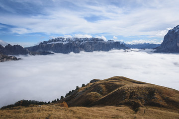 Puez-Geisler Nature Park in autumn with inversion clouds, Dolomites Italy
