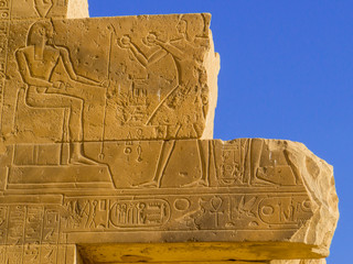 Hieroglyphics on wall in the Ramesseum Temple in Luxor, Egypt