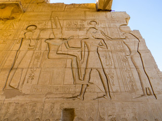 Hieroglyphics on wall in the Ramesseum Temple in Luxor, Egypt