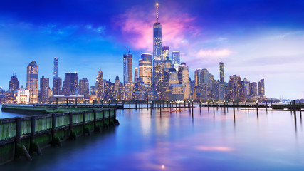 amazing view lower Manhattan , New York City - financial district after sunset from New Jersey