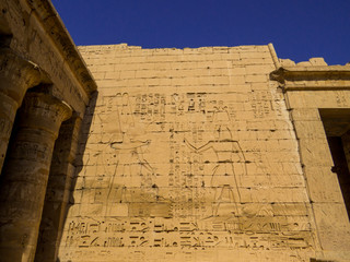 Hieroglyphics in the Medinet Habu Temple in Luxor, Egypt