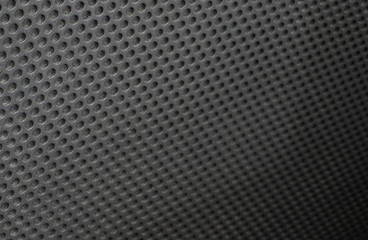 The black background of the grille