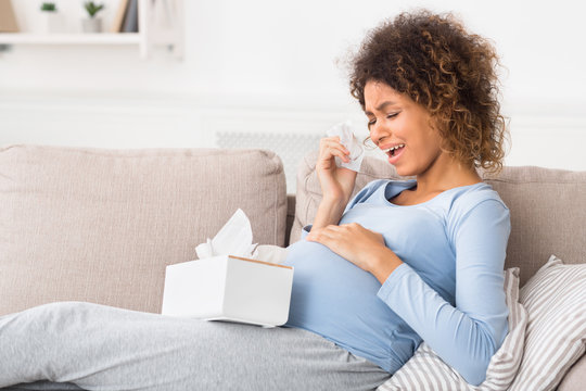 Pregnancy hormones concept. Emotional pregnant woman crying
