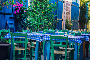 Fototapeta na wymiar Cafe shop stools and tables blue background.