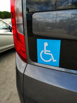 mini van with symbol for disabled transport