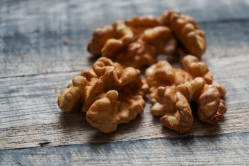 walnut kernels on wooden table