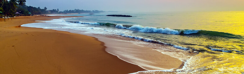 panoramic tropical beach at sunset or sunrise