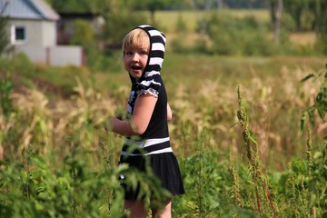 little girl in the garden