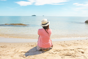 Fototapeta na wymiar Woman Looking At The Sea