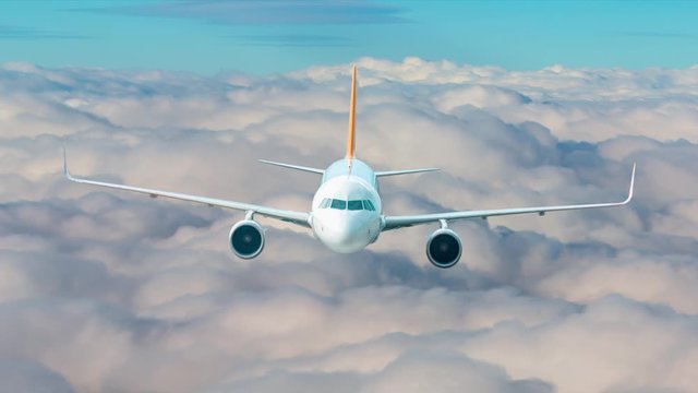 Airplane in sky with clouds
