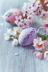 Easter Decoration and Spring Flowers on wooden background. 