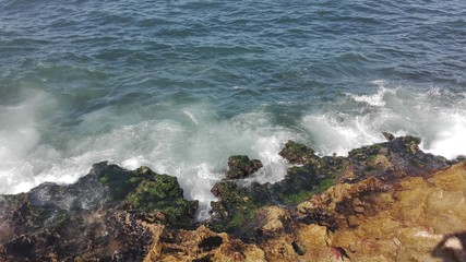 waves crashing on the rocks