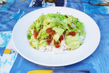 Rice with stir-fried cabbage and dried shrimp on top