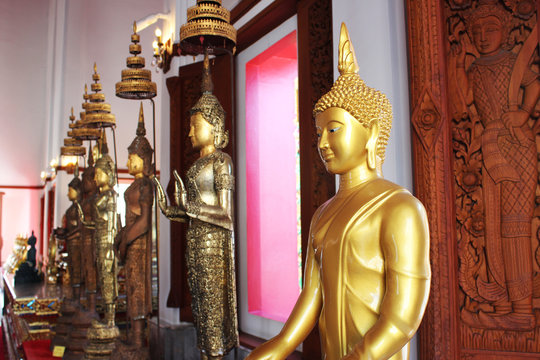 The golden Buddha statues at Thai temple, Bangkok, Thailand