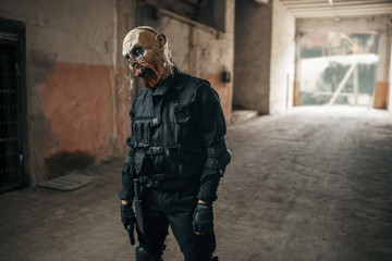 Male zombie walking in abandoned factory