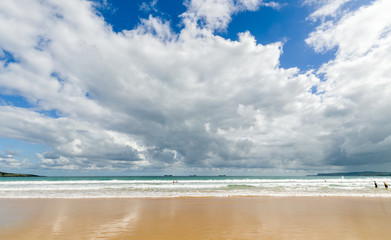 Fototapeta na wymiar Beach with spectacular clouds sky