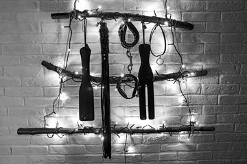 Christmas tree with xmas adult toys, BDSM concept. BW. © Elena