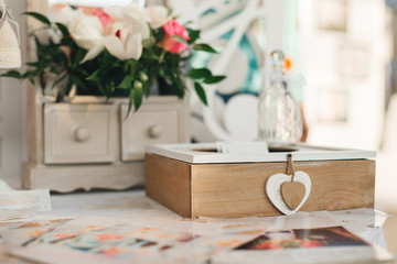 Wooden box with hearts in the decor of a wedding or a house in rustic style