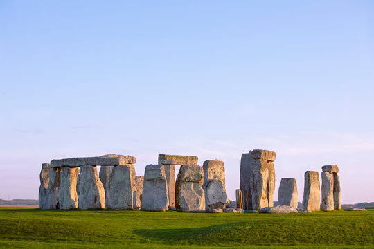 Stonehenge, clear evening sky. Prehistoric monument in Wiltshire, England. Historic Neolithic Stones. No people.