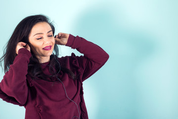 woman listen to music in studio