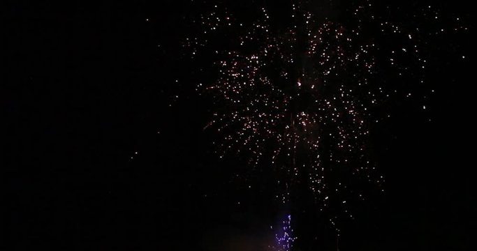 Abstract colored firework background, Celebration and anniversary concept. Fireworks in slow motion in night sky