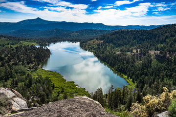 Blue sky reflected in mountain lake, Carson Pass, California