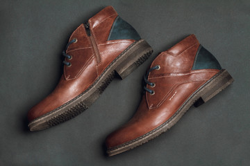 Men's shoes on black background