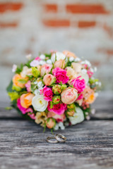 wedding rings and flowers