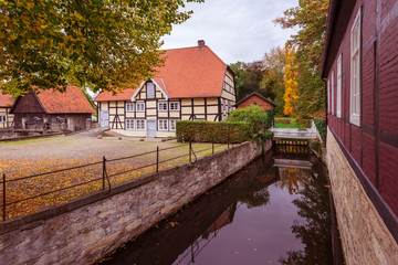 Fototapeta na wymiar Water mill, river Ems, Rheda Castle, Rheda-Wiedenbrueck, Muensterland region, North Rhine-Westphalia, Germany, Europe