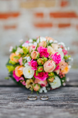 wedding rings and flowers