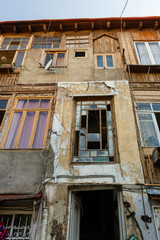 Fototapeta na wymiar Entrance with facade of old houses in historical part of Tbilisi, Georgia.