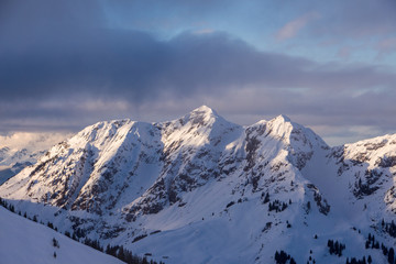 Mountain portrait Birnhorn Saalbach dramatic clouds perfect blue sky light scenic mood