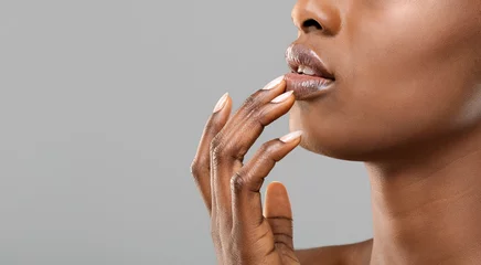 Fotobehang Unrecognizable black woman touching her beautiful plump lips © Prostock-studio