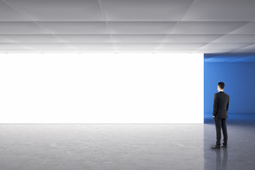 Fototapeta premium Businessman in gallery interior