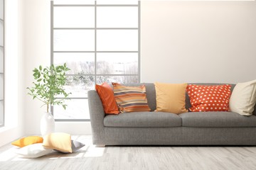 Stylish room in white color with sofa and winter landscape in window. Scandinavian interior design. 3D illustration