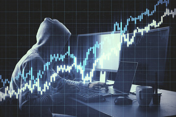 hacker at desktop using computer