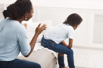 Quarrel between african american mom and daughter