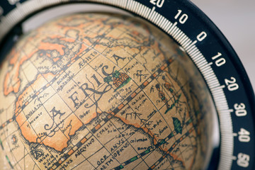 Vintage globe closeup, located on Africa. Concept for travel commercial.   