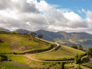 Fototapeta premium Landscape with country roads crossing the farmlands near the colonial town of Chiquiza, in the Central Boyacá Province, part of the Colombian Department of Boyacá.