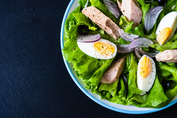 Tuna salad on black stone plate