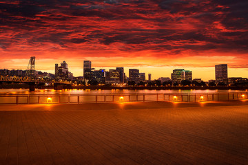 Red sky during wonderfuly colored dawn with view on Portland downtown, Oregon, USA