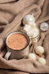Obraz na płótnie Canvas Mug of cocoa with warm blanket. Winter mood.