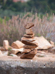 Fototapeta na wymiar Stacked rocks (Cairn) on Lokrum Island, Croatia 