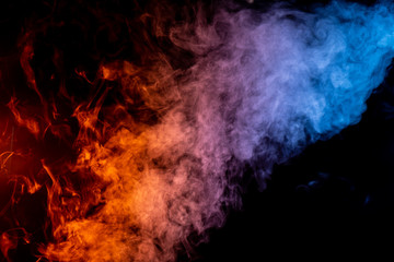 Fototapeta premium Orange, Red, and Blue Smoke on Black Background