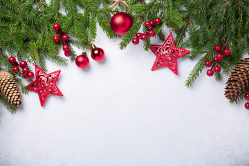 Christmas background with fir tree and red gifts. Top view Copy space