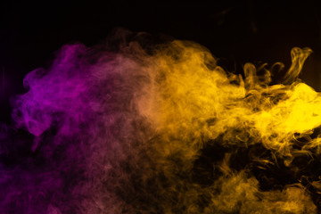 abstract purple and yellow smoke on black background